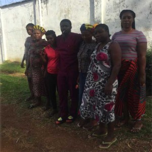 Walking outside the Saint Benedict Menni Mental Health Center in Monrovia